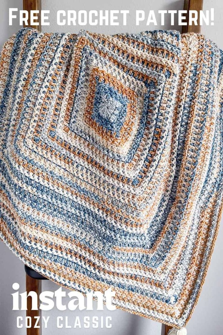 a crocheted blanket sitting on top of a wooden chair