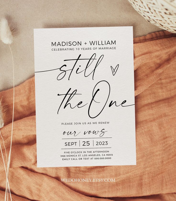 a wedding card with the words still on the one written in cursive ink