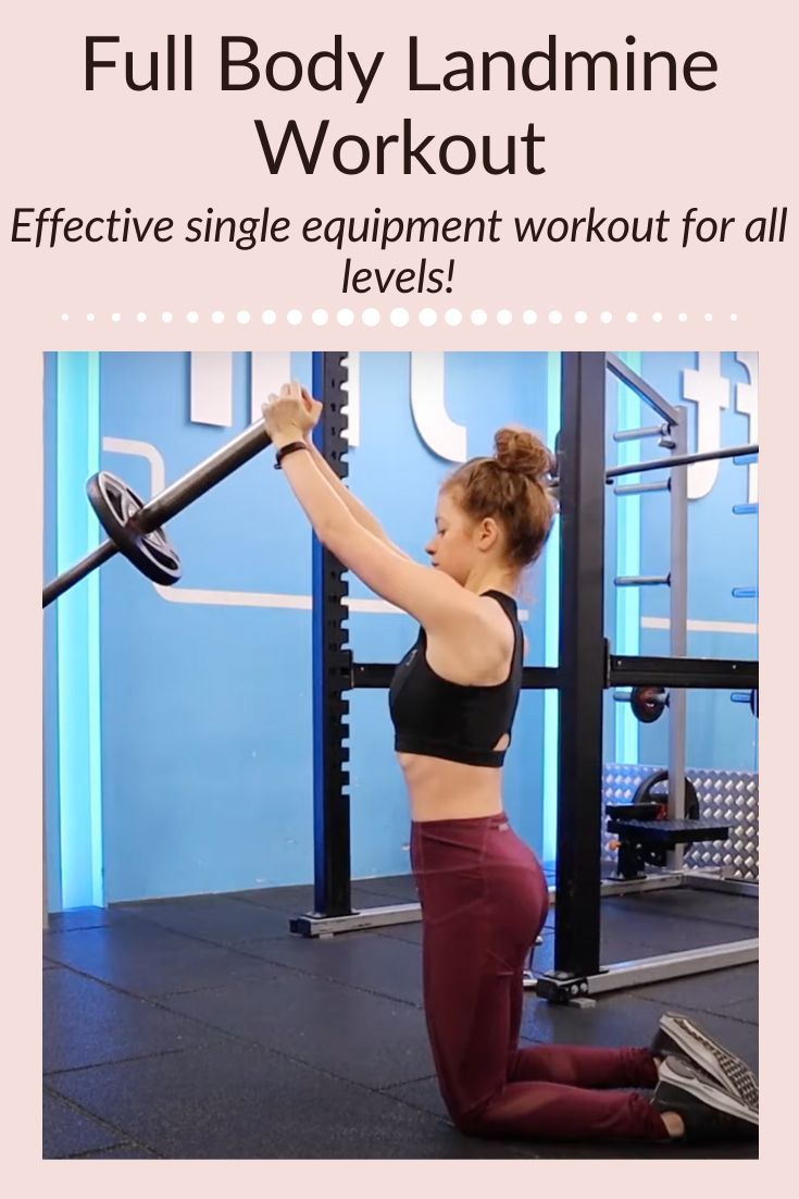 a woman squats in front of a gym machine with the text full body landine workout