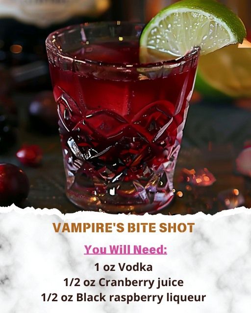 the vampire's bite shot is served in a glass with lime and cranberry juice