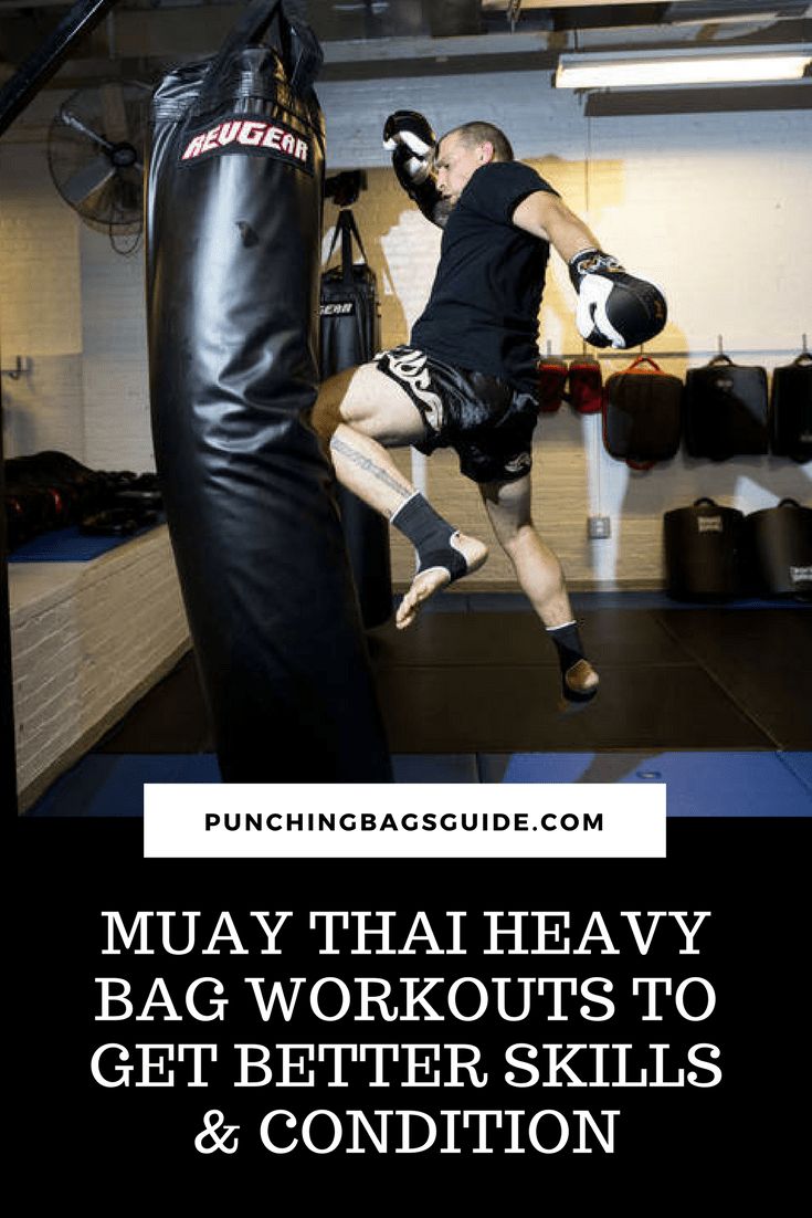 a man kicking a punching bag with the words muay thai heavy bag workouts to get better skills and condition