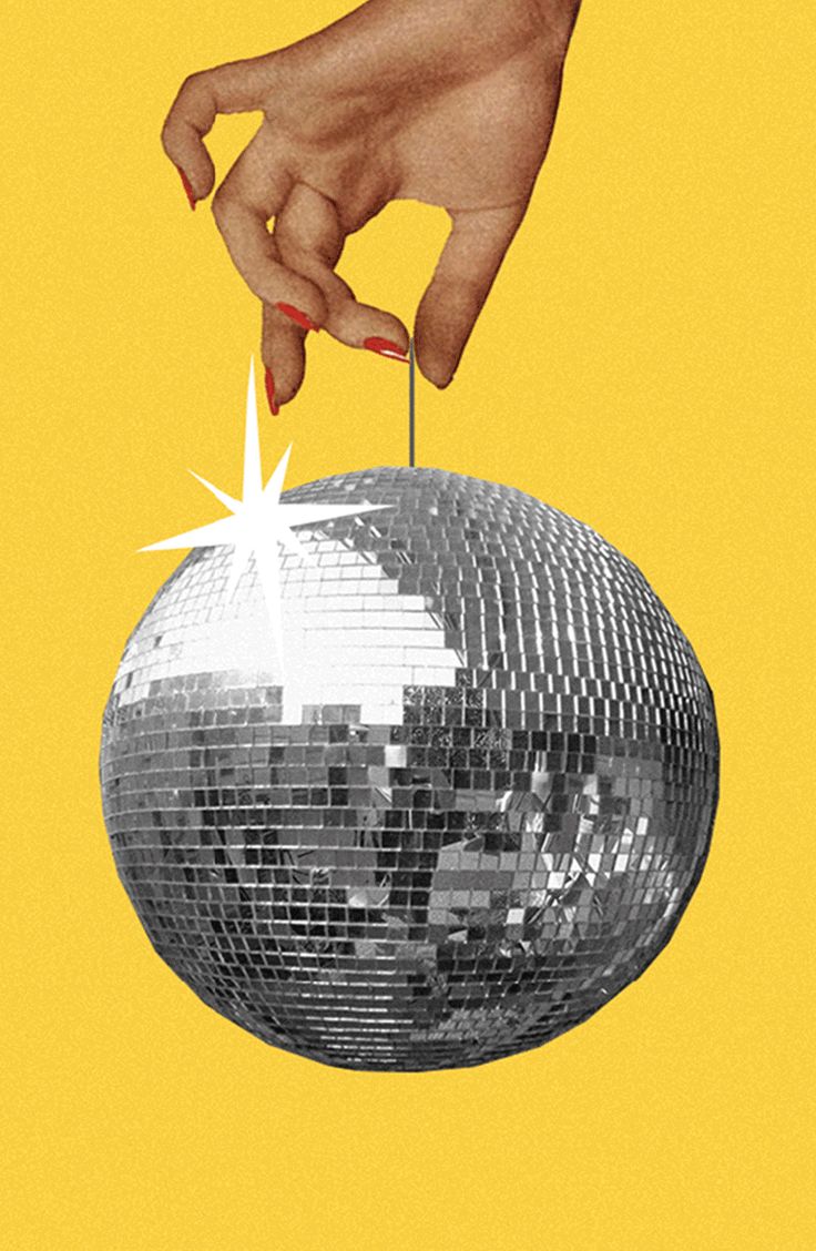 a hand reaching for a disco ball on a yellow background