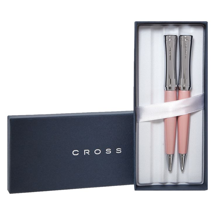 two pink and silver pens in a box