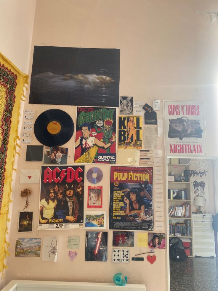 a wall covered in posters and other items