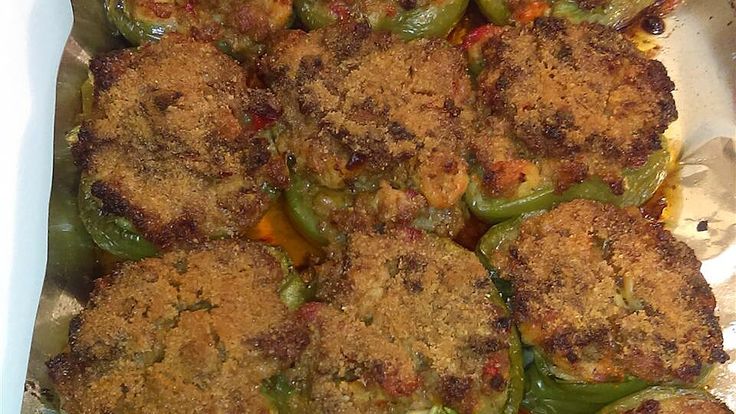 some food is sitting in a pan on the table and ready to be eaten,