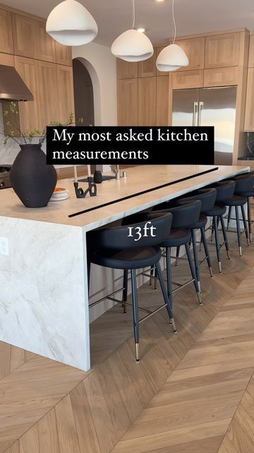 a large kitchen island with stools next to it and the words, my most asked kitchen measurements