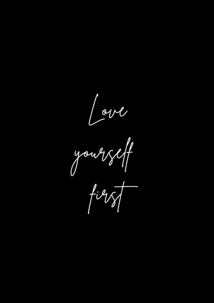 the words love yourself first written in white on a black background