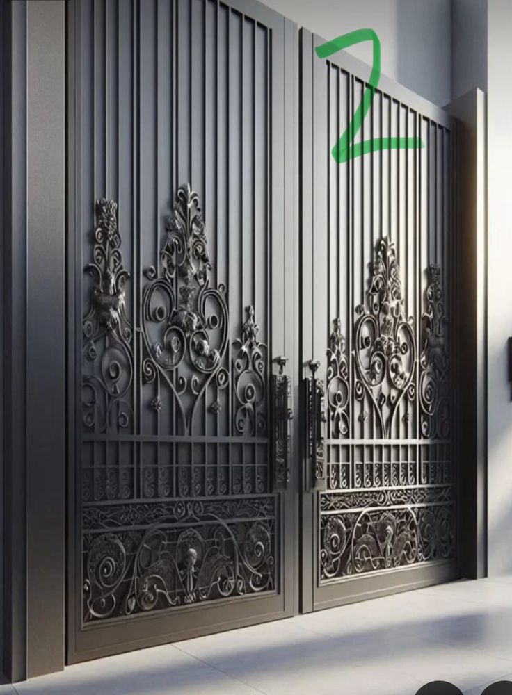 an iron gate is shown in front of a white wall with green arrow pointing to the left