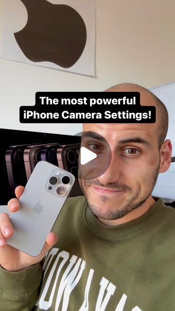 a man holding an iphone in front of his face with the caption'the most powerful iphone camera settings '