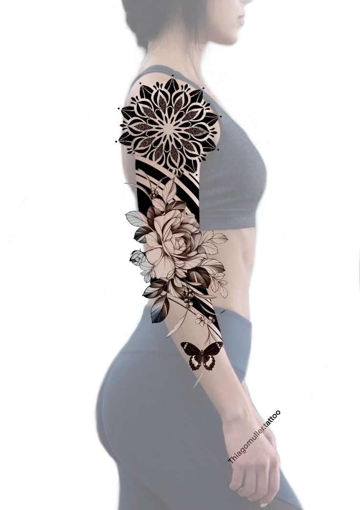 a woman's arm with flowers on it, and the back of her body