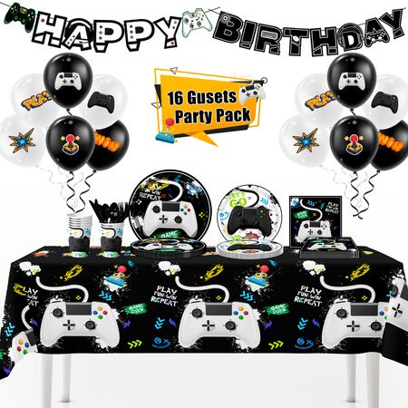 an image of a birthday party set up with video game controllers and balloons on the table