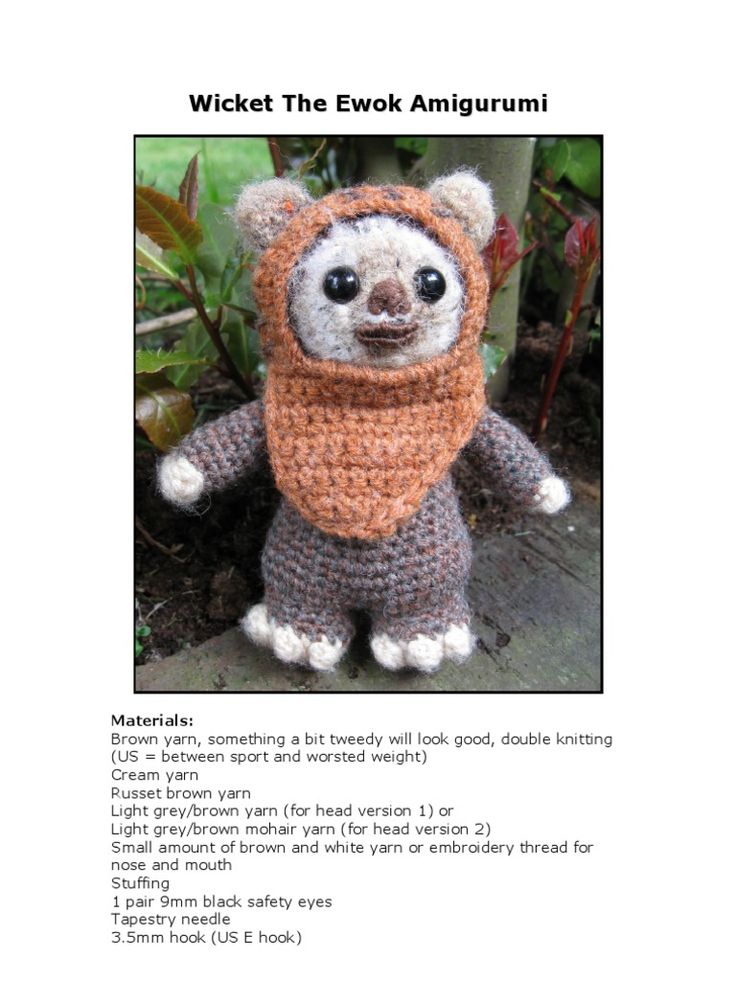 a crocheted stuffed animal with a scarf around its neck and the caption written below