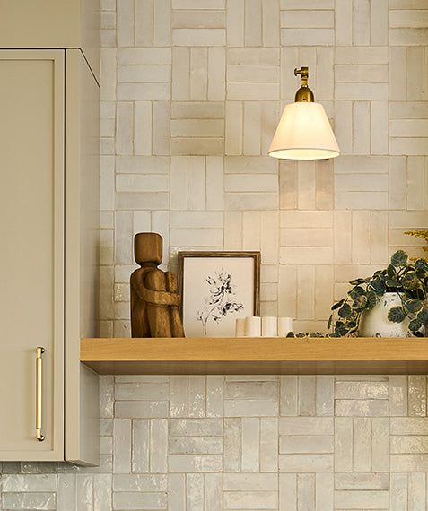 A carved, wooden figure holding it's knees Kitchen Backsplash Walnut Cabinets, Sink Wall Kitchen No Window, Natural Tile Backsplash Kitchen, Spanish Kitchen Island, Traditional Backsplash Ideas, Kitchen Backsplash Wood, Kitchen Backsplash Classic, Plant Wall Kitchen, Kitchen Timeless