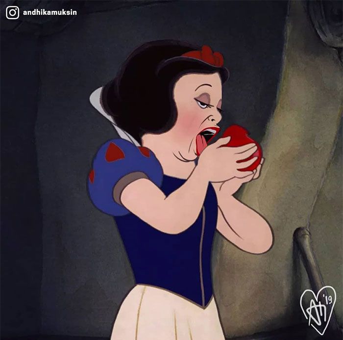 snow holding an apple in her hands