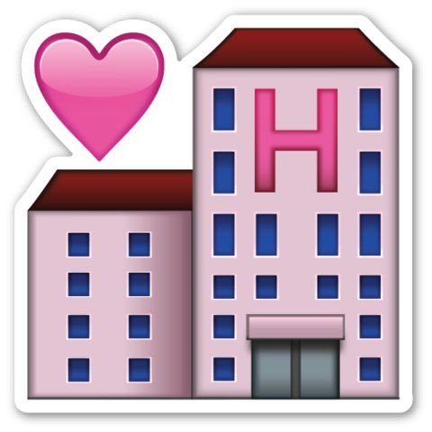 a pink building with a heart on top and the words home is where the heart is