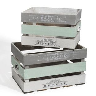 three wooden crates stacked on top of each other with the words la bastide