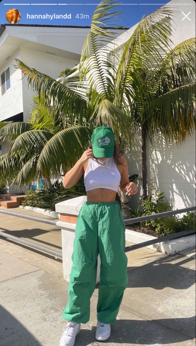 Cotton Fest Outfits, Green Balloon Pants Outfit, Festival Green Outfit, Green Parachute Pants Outfits, White Balloon Pants Outfit, Bright Green Cargo Pants Outfit, Balloon Trousers Outfit, Green Baggy Pants Outfits, Green Track Pants Outfit