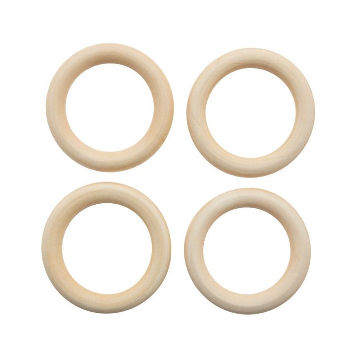 four wooden o - rings are shown on a white background, with one ring in the middle