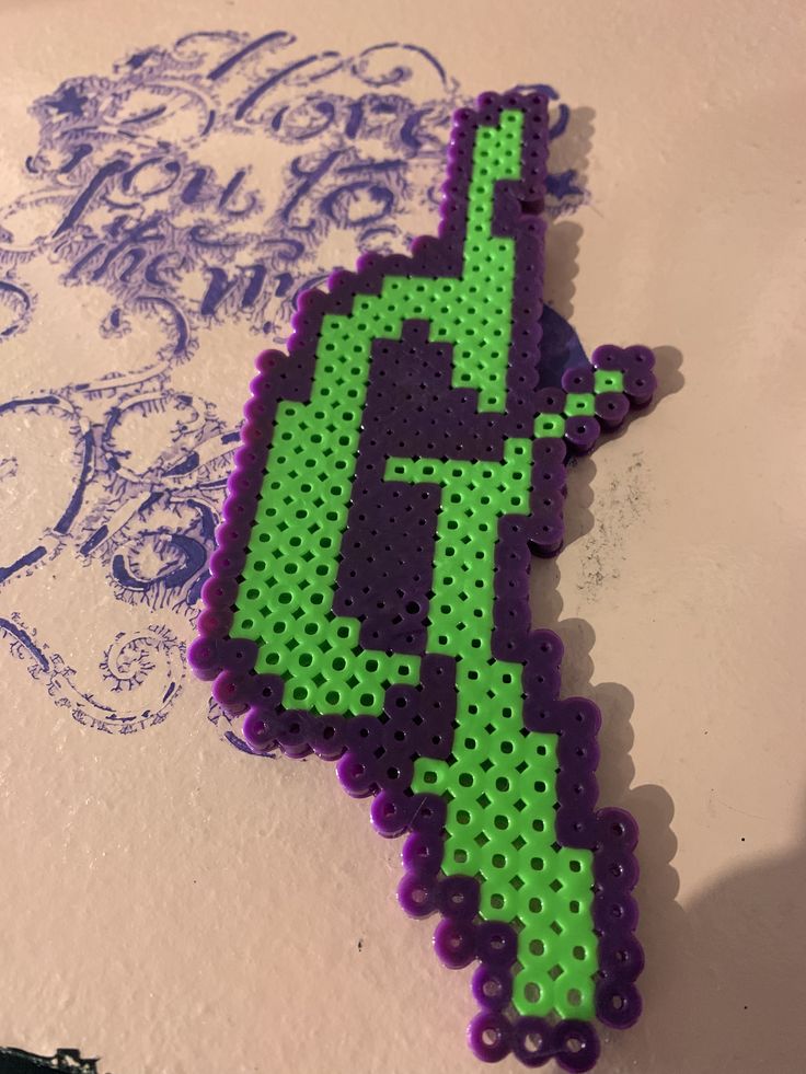 a piece of art made out of perler beads