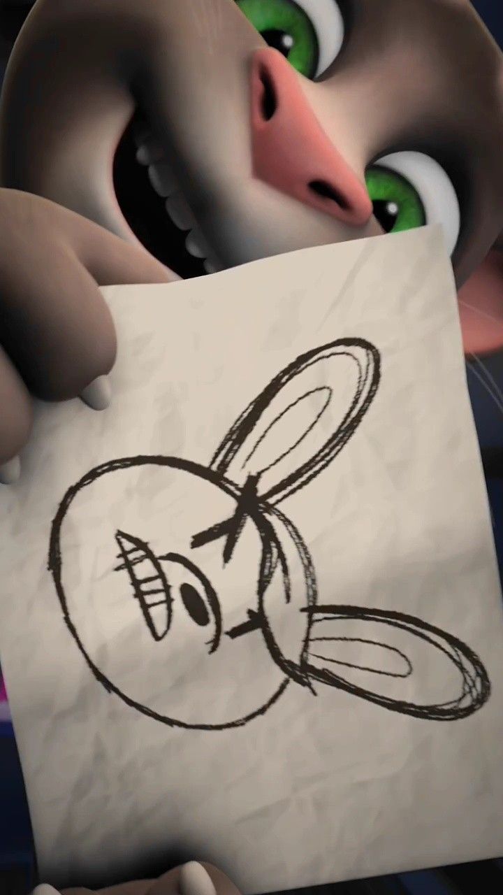 a cartoon character holding up a piece of paper with an angry bird drawn on it