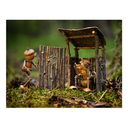 an image of a doll house made out of wood and toys in the grass with text overlay