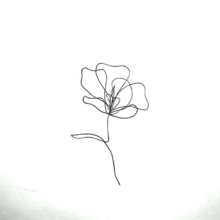 a single flower is shown in the middle of a white background with black writing on it