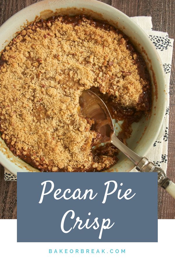 pecan pie crisp in a white dish with a serving spoon