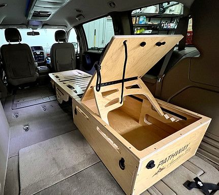 the interior of a van with an open trunk