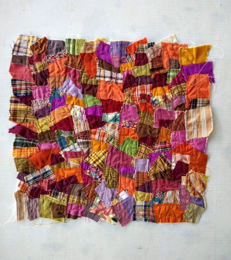 a piece of cloth that has been made with different colors and patterns on the fabric