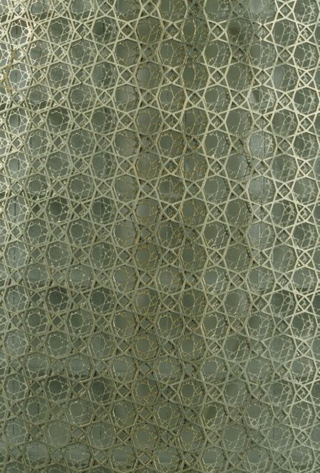 an image of the back side of a curtain with circles on it's fabric