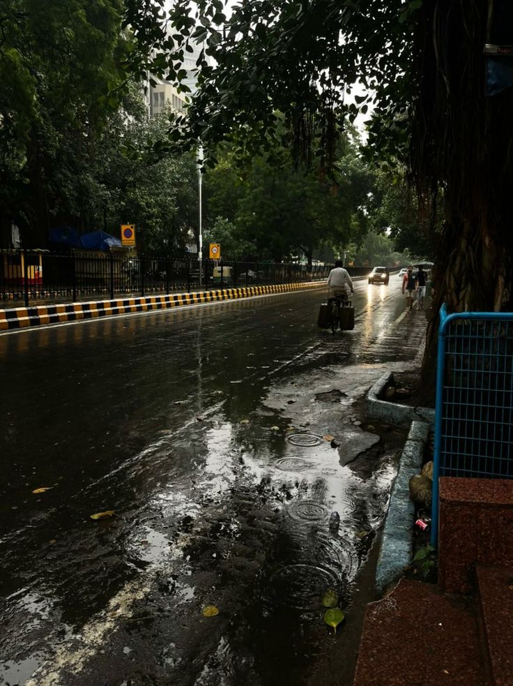 the street is flooded with rain and water