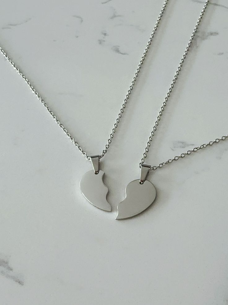 Two half heart necklace set. All materials are stainless steel. Each order comes with 2 necklaces which together will form a whole heart when placed side by side. All necklaces will be 20 inches in length unless requested otherwise.  How to order:  Step 1: Select the colour for your necklace set Minimalist Double Heart Stainless Steel Necklace, Heart-shaped Metal Necklaces For Friendship, Heart-shaped Metal Necklace For Friendship, Valentine's Day Stainless Steel Necklace, Heart Pendant Stainless Steel Necklace For Best Friend, Stainless Steel Heart Pendant Necklace For Best Friend, Heart Pendant Necklace In Stainless Steel For Best Friend, Heart-shaped Stainless Steel Jewelry For Friendship, Minimalist Heart Shape Stainless Steel Charm Necklace