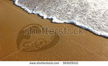 an inscription written in the sand at the beach