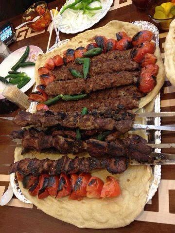 there are several different types of food on the table with utensils in front of them