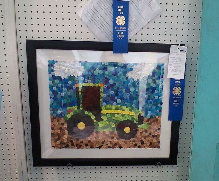 there is a picture of a tractor on the wall in this store, it's blue and green