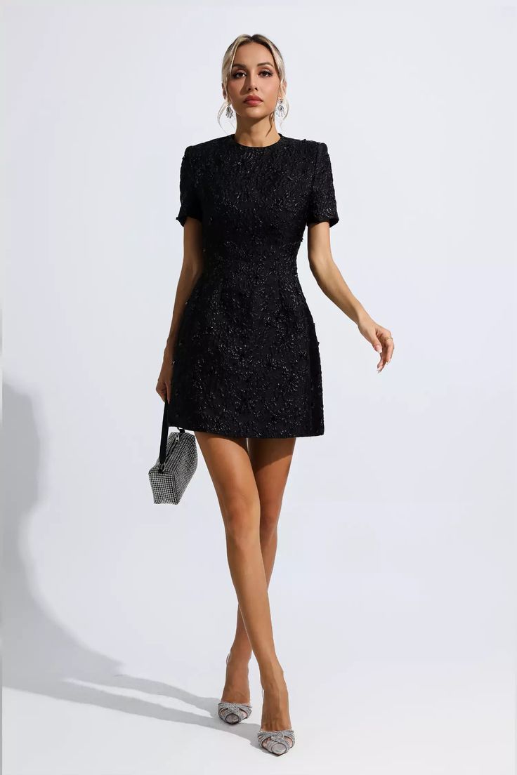 Astrid Black Jacquard Floral Mini Dress is the perfect choice for chic and elegant looks. Crafted from luxuriously soft jacquard fabric the short mini sleeves and skirt create an effortlessly chic look while the floral design adds a classic touch to this dress. It's trimmed with dainty sequins for a unique touch.Dress Glitter Wedding Dress, Vintage Floral Top, Summer Swag, Bandage Midi Dress, Looks Party, Chic And Elegant, Puff Sleeve Dresses, Jacquard Fabric, Ruched Dress