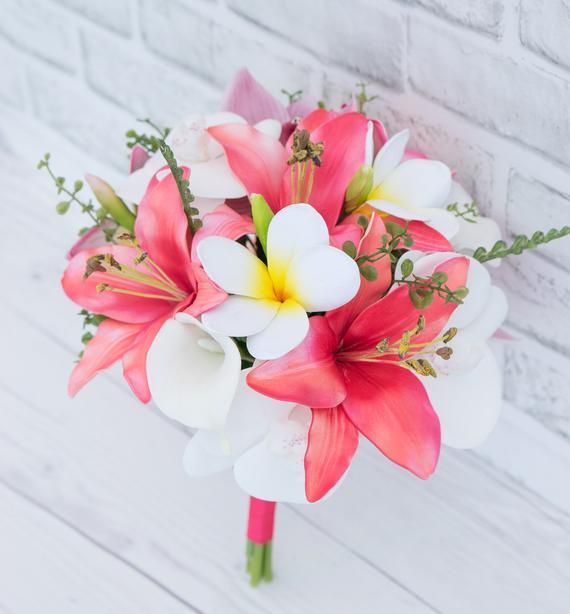 a bridal bouquet with pink and white flowers