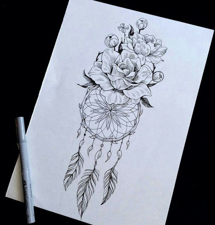 a drawing of flowers and feathers on paper