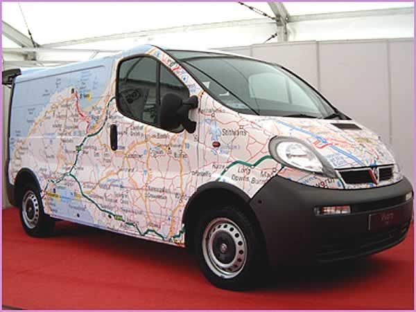 a small van with a map on it's side