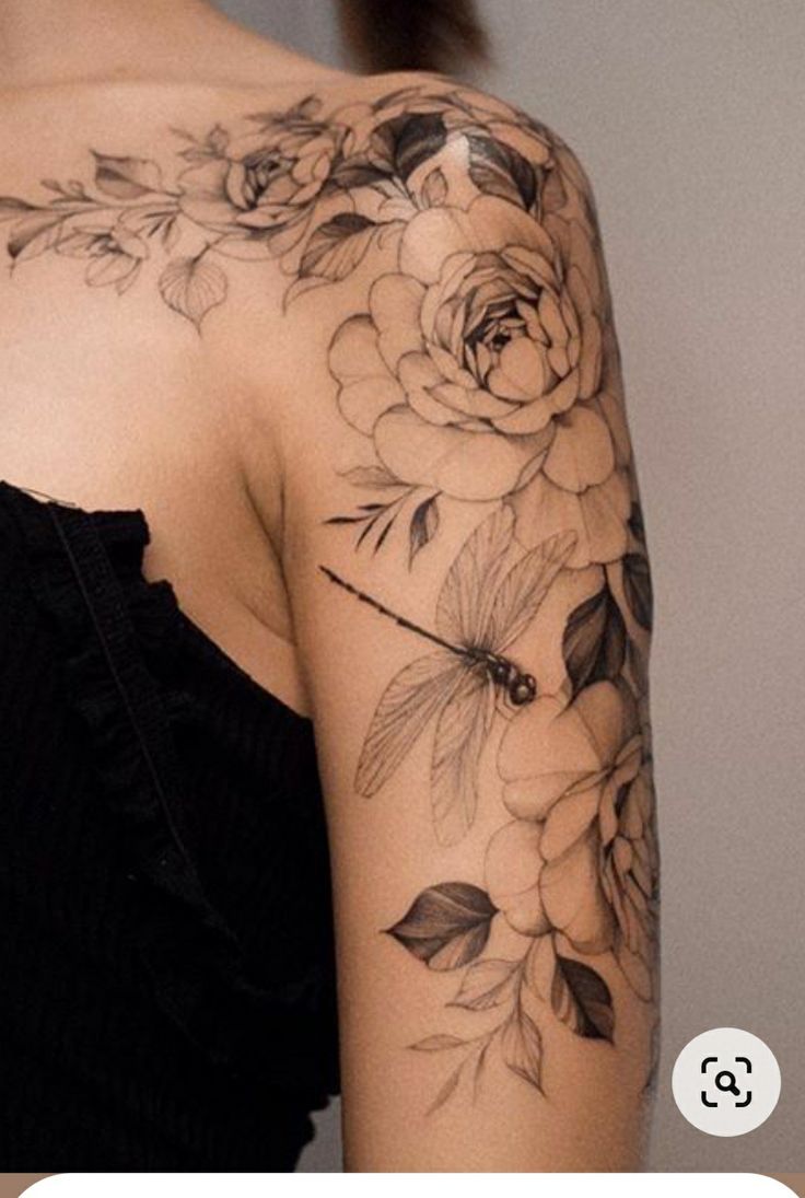 a woman's shoulder with flowers on it and the words, how to cover up tattoos