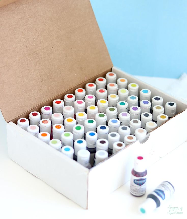 a box filled with lots of different colored markers