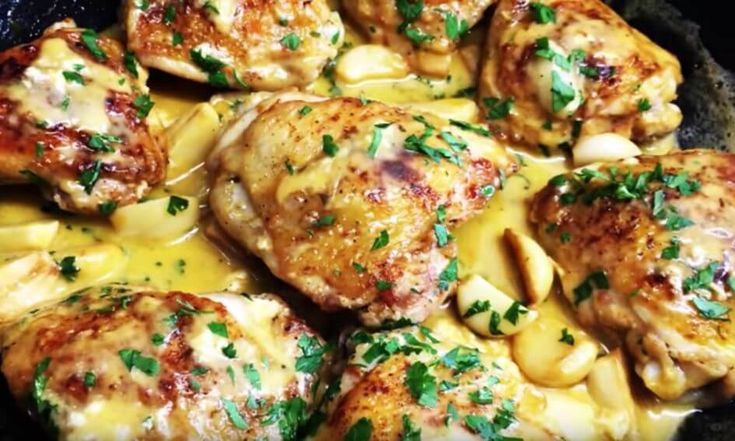 some chicken and pasta are in a skillet