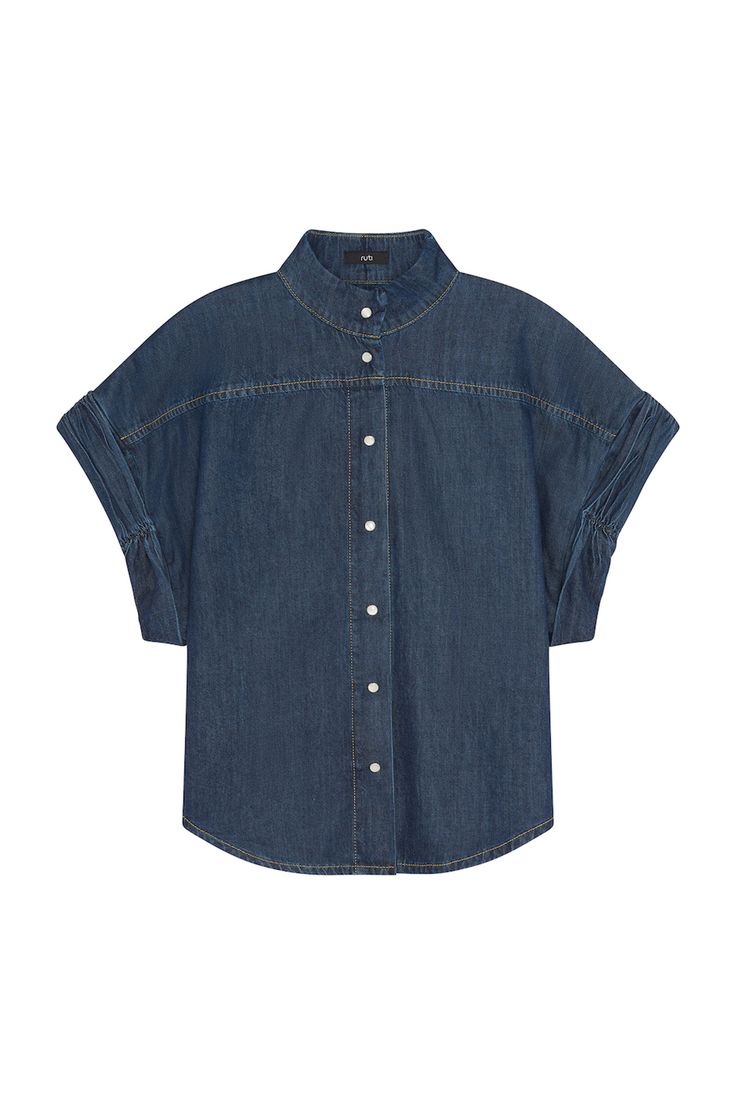 This dark wash denim blouse will elevate any formal or casual look. Pair with your favorite pants or denim jeans for a laid-back yet chic vibe. Oversized fit Open collar Button down Short sleeves Chic Short Sleeve Relaxed Fit Denim Top, Dark Wash Summer Top For Work, Denim Blue Summer Blouse For Work, Classic Denim Top For Summer, Relaxed Fit Denim Blouse With Buttons, Collared Denim Blue Denim Blouse, Chic Relaxed Fit Short Sleeve Denim Top, Summer Workwear Medium Wash Blouse, Spring Dark Wash Shirt For Work