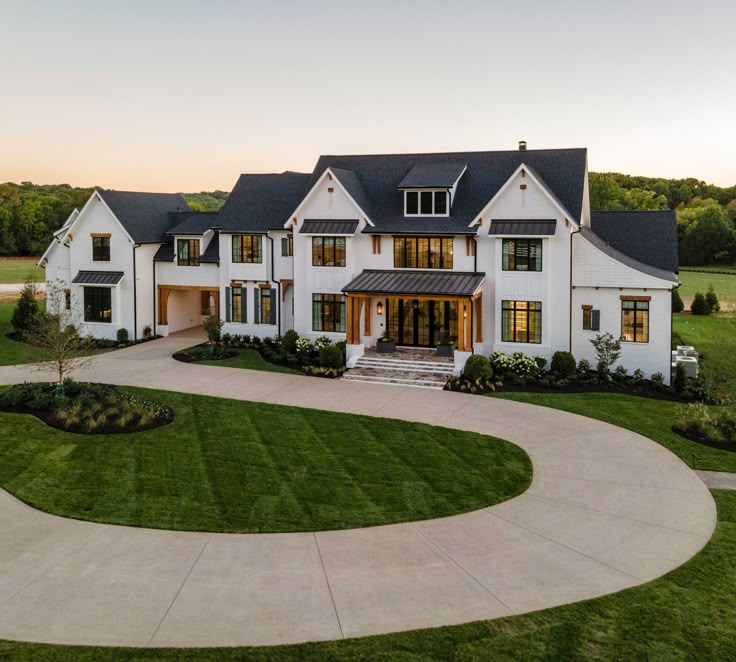 a large white house with lots of windows