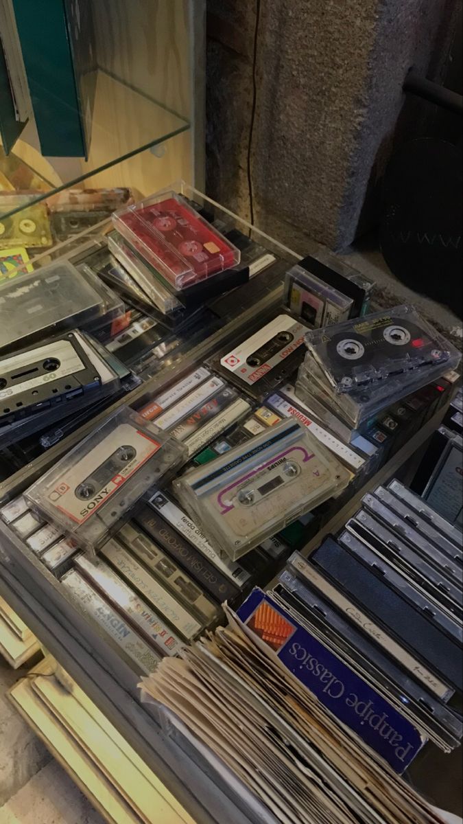 there are many cassettes on the table