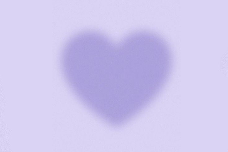 the shadow of a heart on a purple background