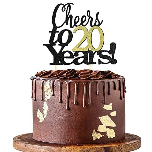 a chocolate cake with the words cheers to 20 years on top