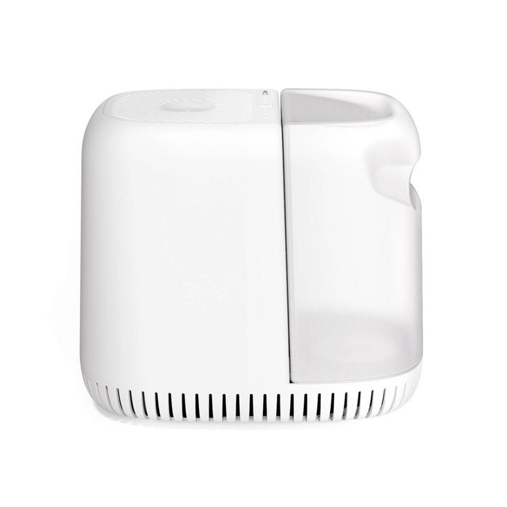 the back side of a white wall mounted air purificater on a white background