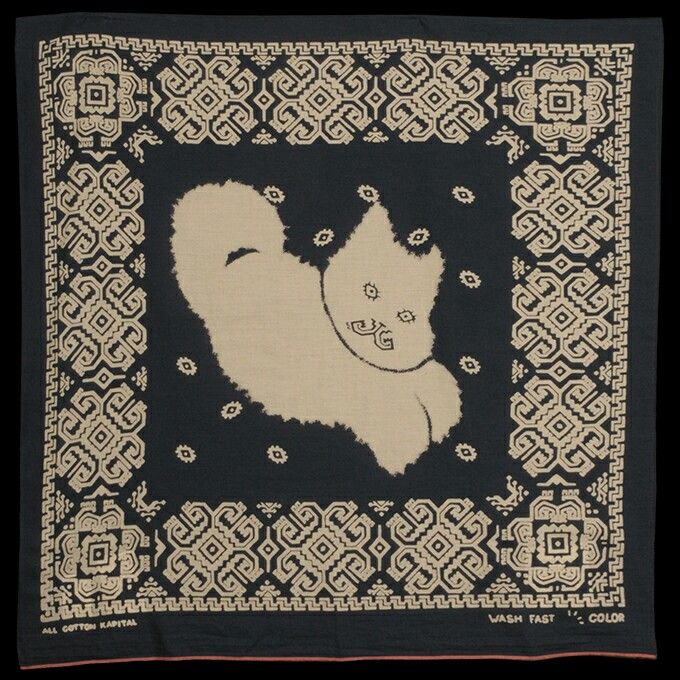 a black and white square with an image of a cat on it