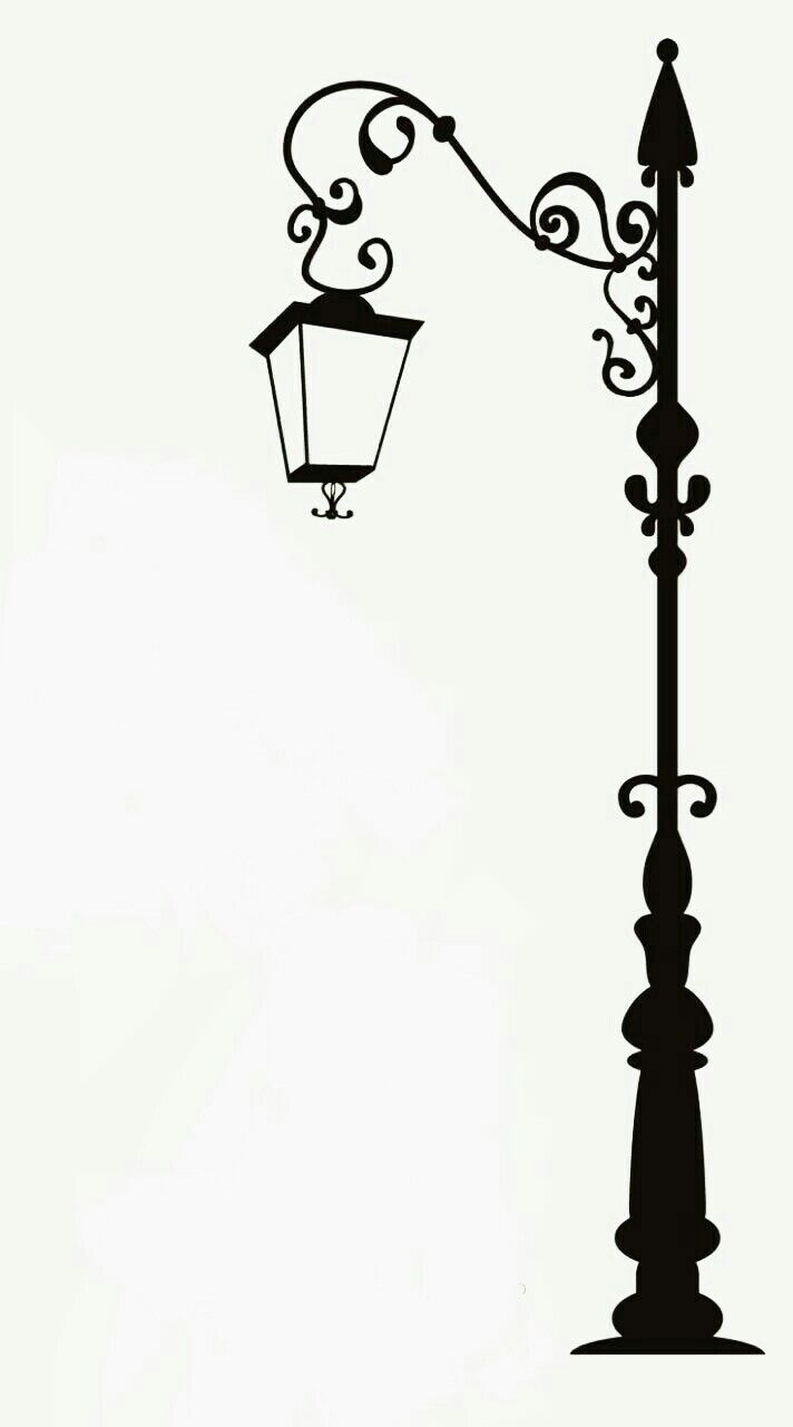 a black and white photo of a street light with an ornate design on the side